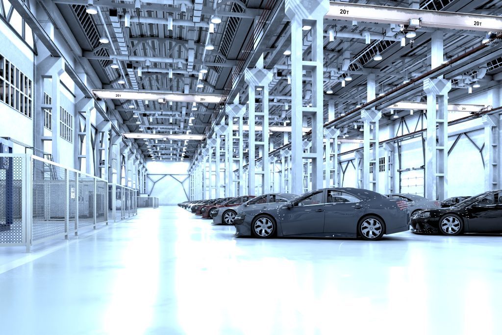 coches en una nave industrial